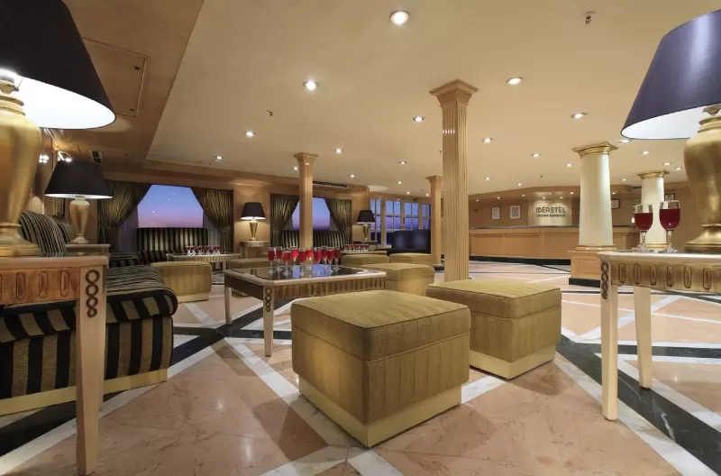 Elegant lounge interior of the Iberotel Crown Emperor Nile Cruise with luxury seating